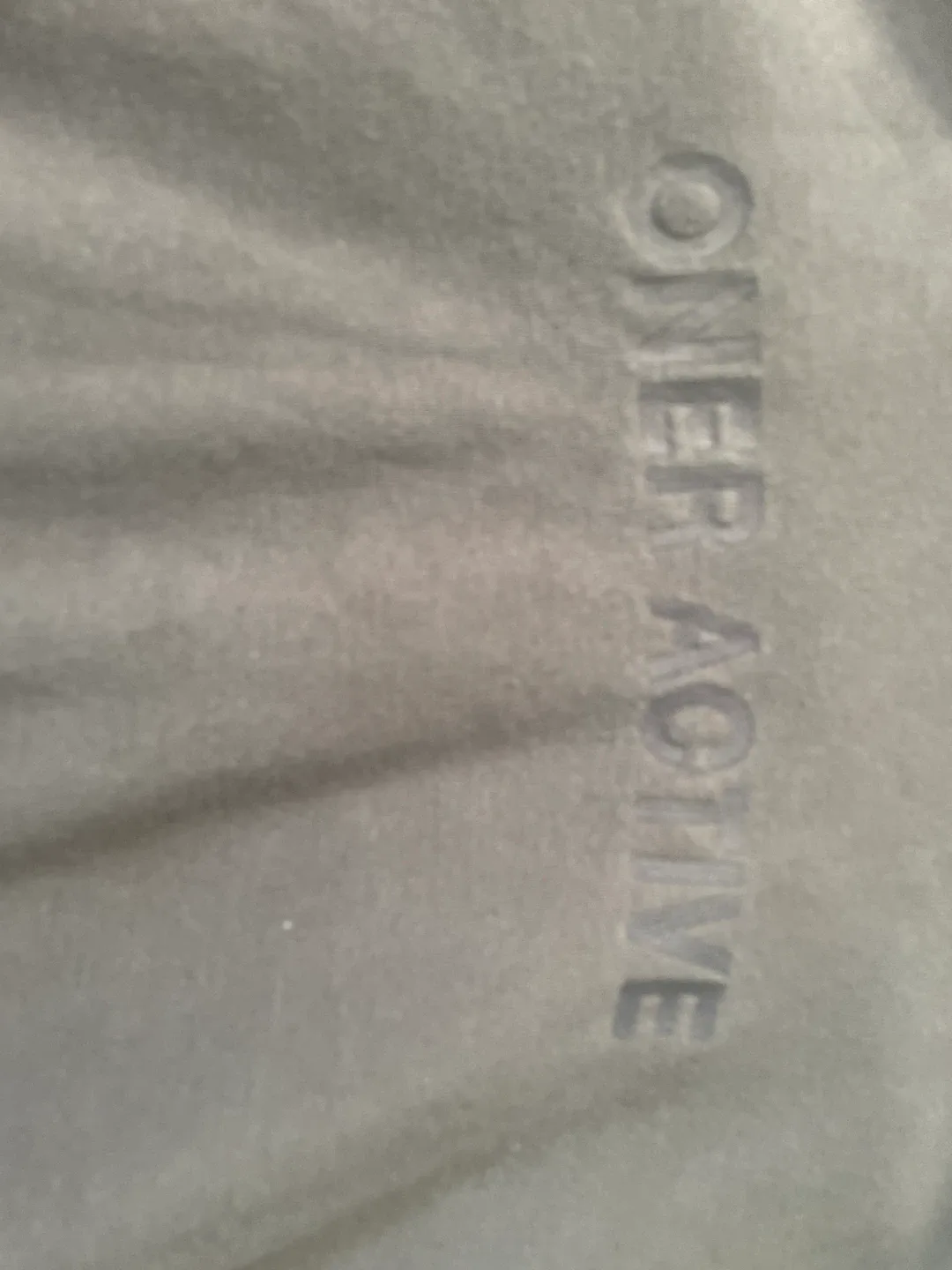 Brown hoodie says oner active image indicator(2)