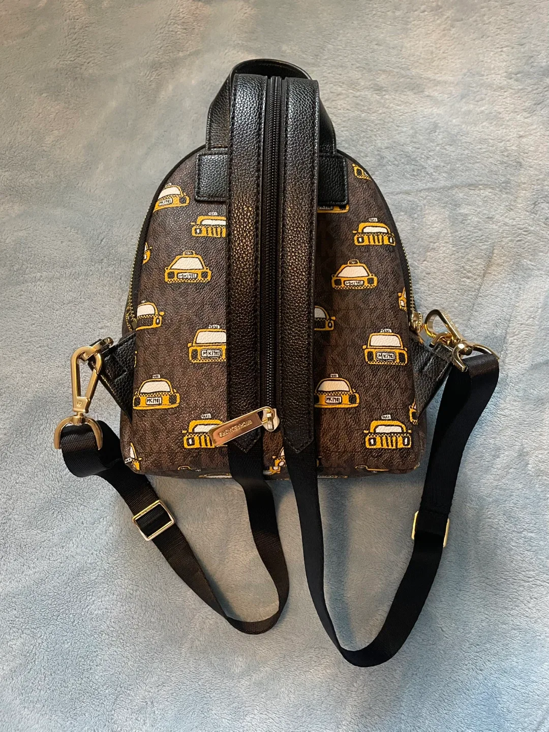 Michael Kors Taxi Print Mini Backpack image indicator(2)