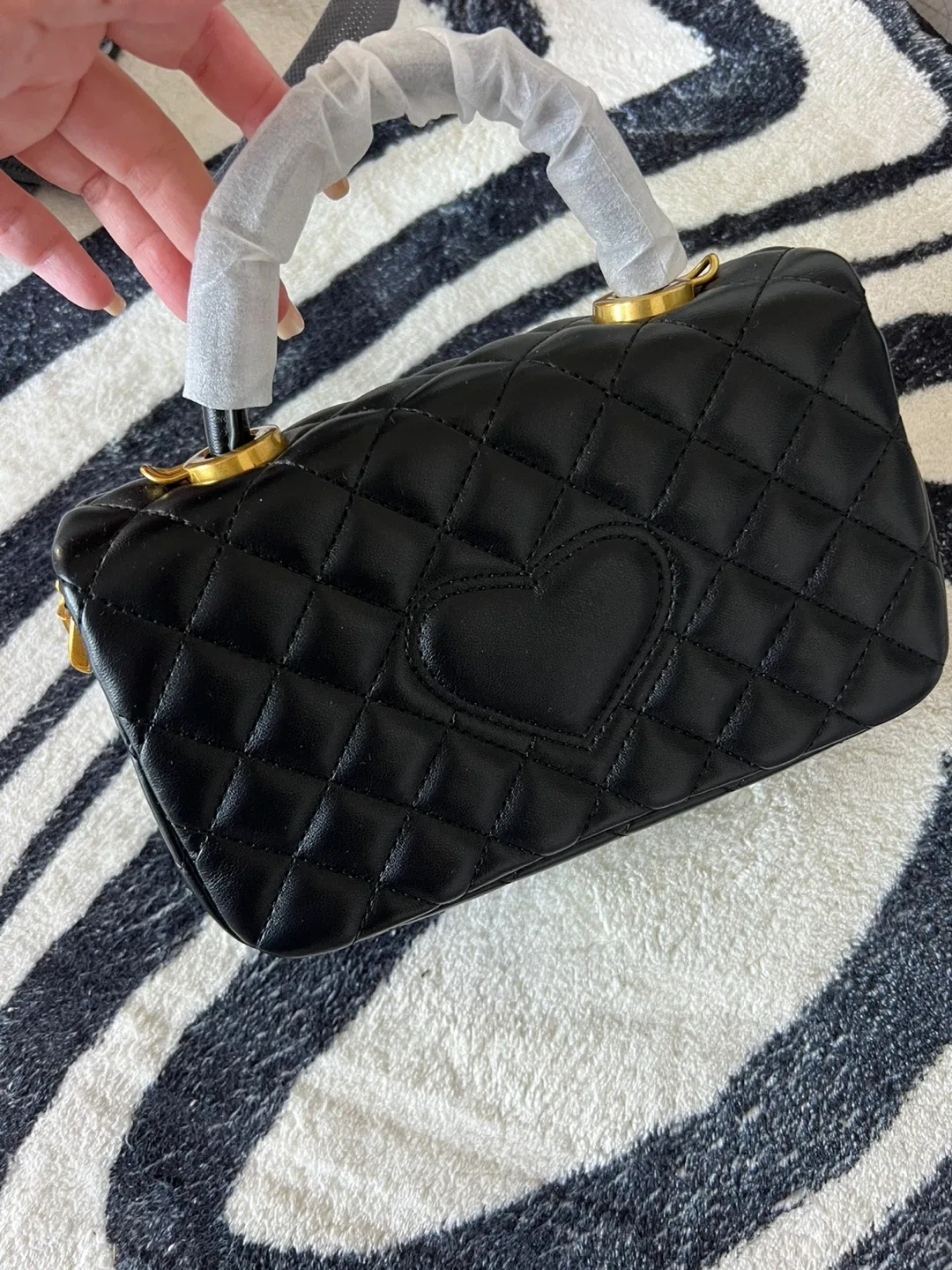 Black Quilted Handbag with Gold Accents image indicator(2)