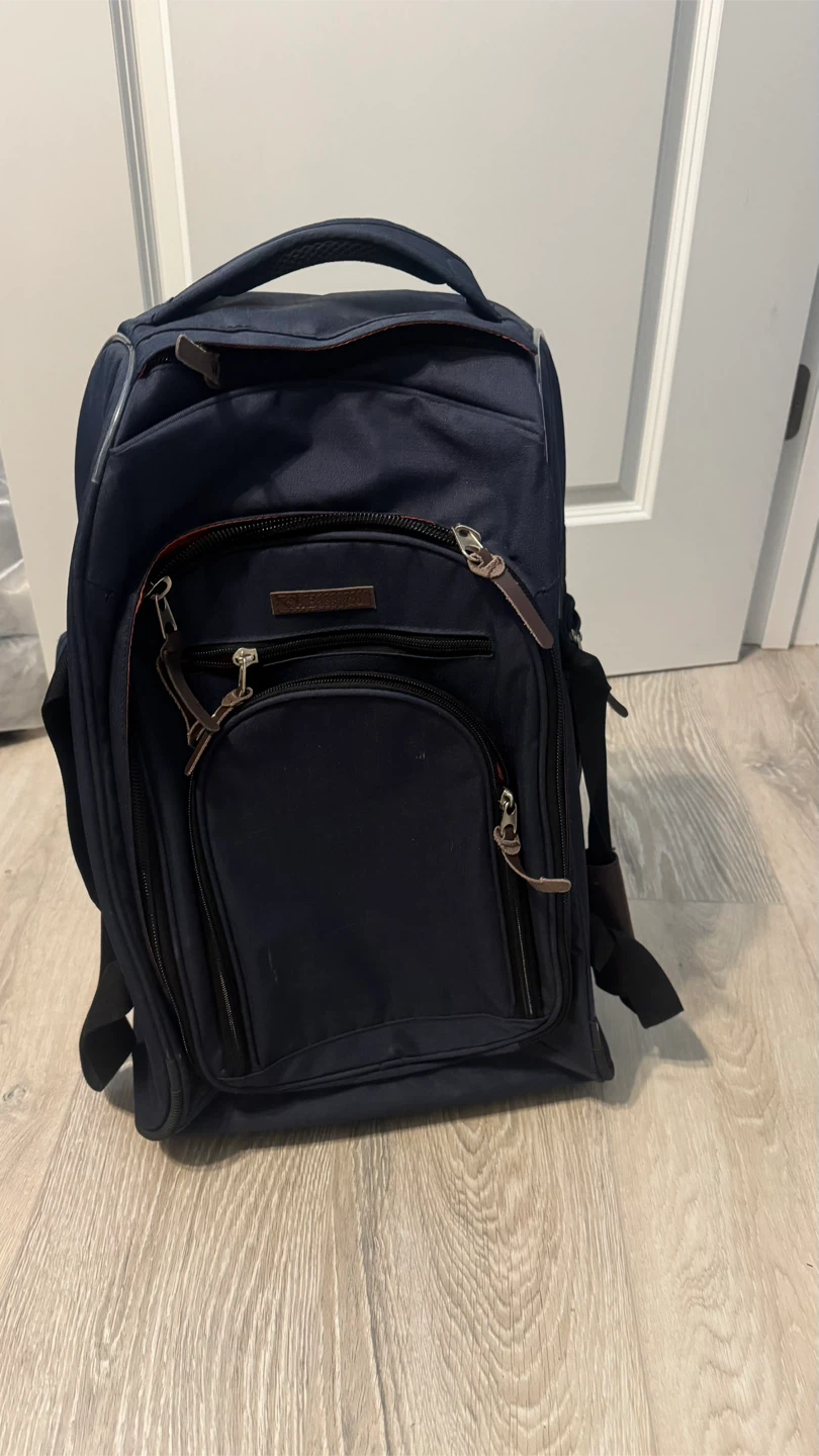 Navy Blue Rolling carry in Backpack