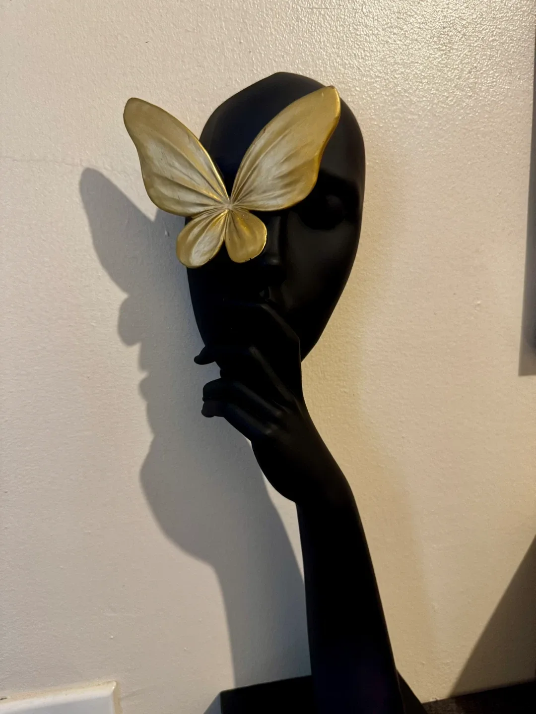 Black Mannequin Head with Gold Butterfly Decor image indicator(2)