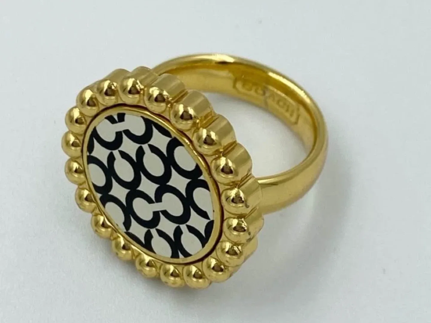 Coach Gold Ring with Black & White Pattern