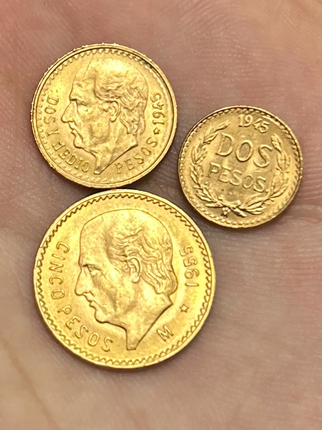 Two Sets of Three Mexican 21k Gold Pesos