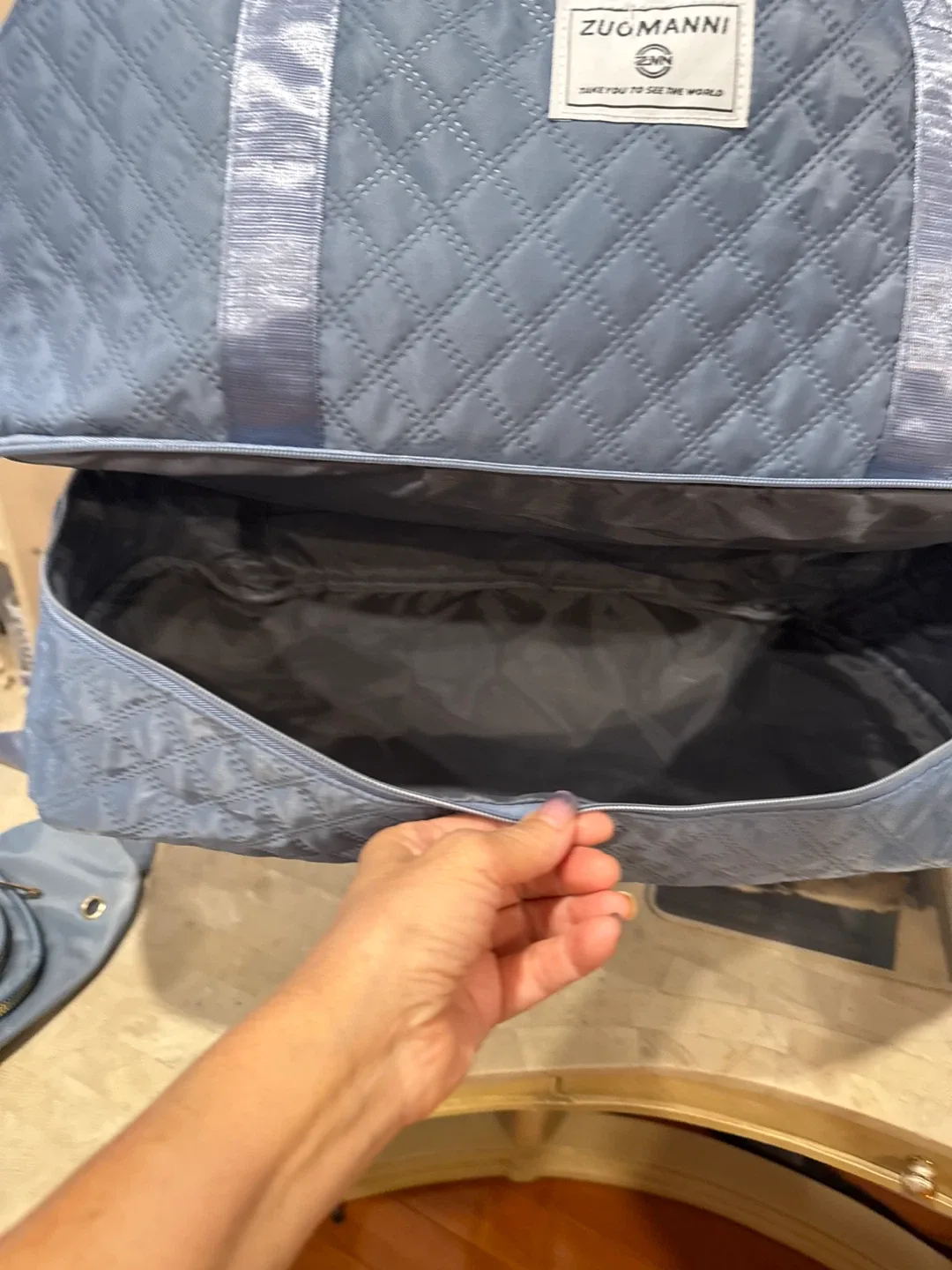 ZUOMANNI Quilted Duffle Bag & Sling Bag Set image indicator(3)