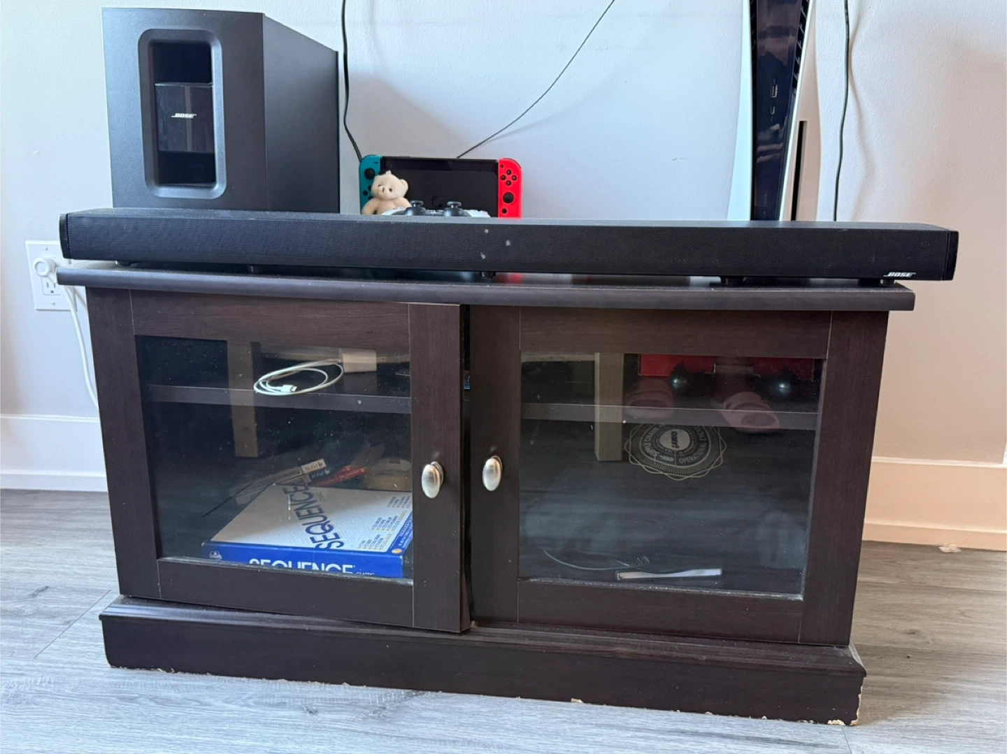 Brown Tv stand with glass doors