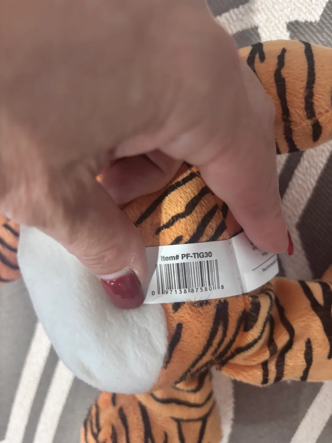 Adorable plush tiger toy with bright blue eyes image indicator(3)