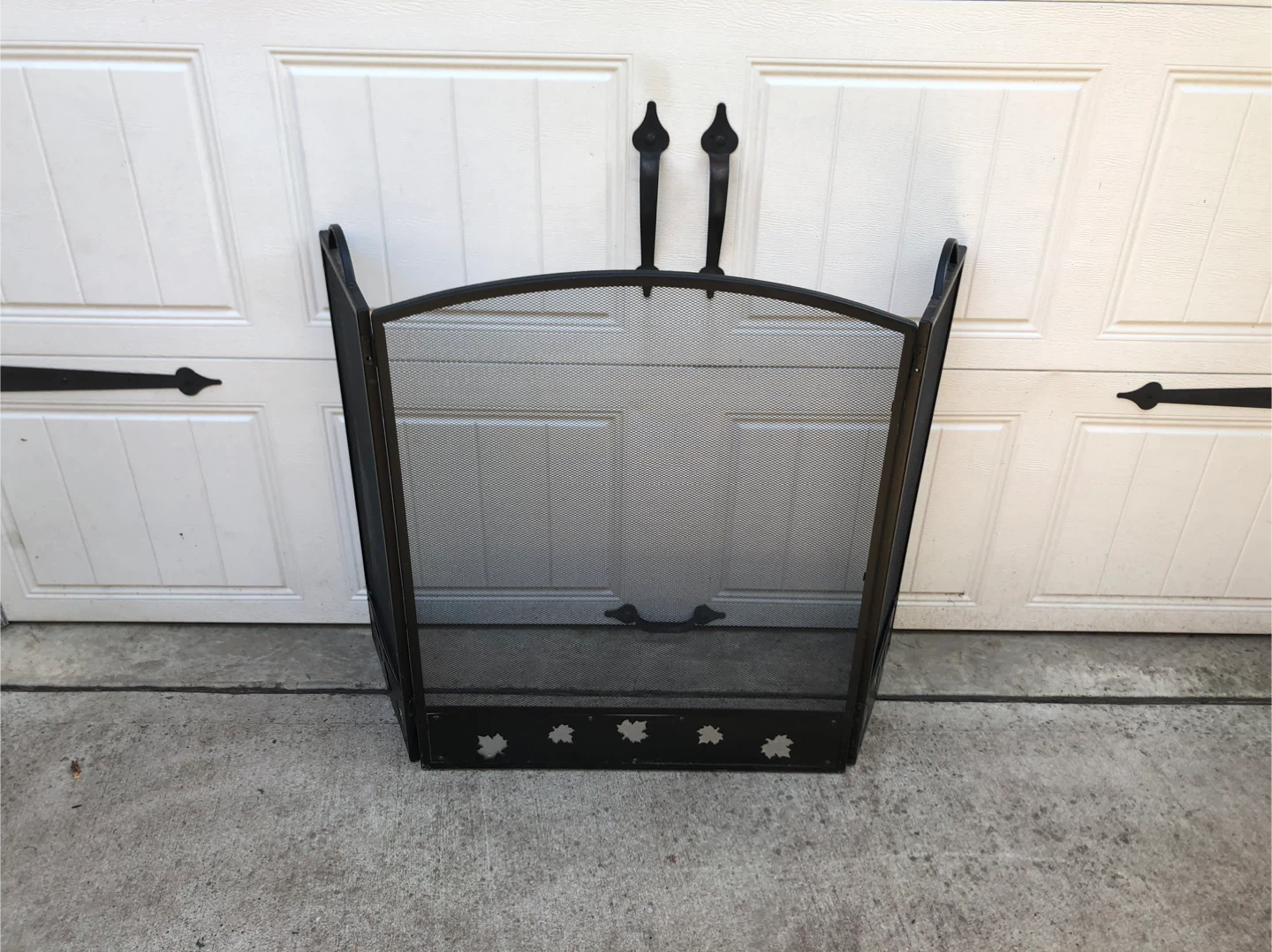 Black Fireplace Screen with Maple Leaf Design