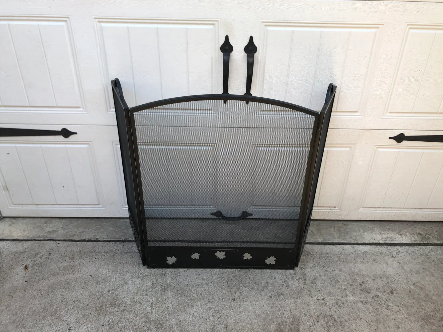 Black Fireplace Screen with Maple Leaf Design