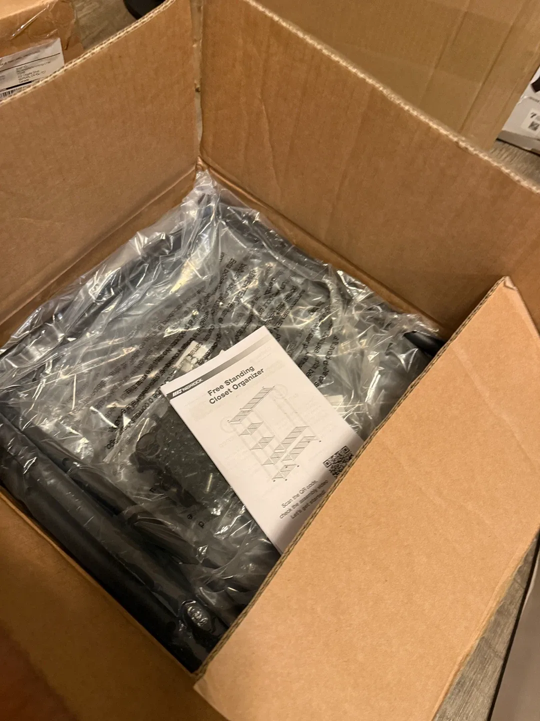 Metal Garment Rack with Shelves image indicator(9)