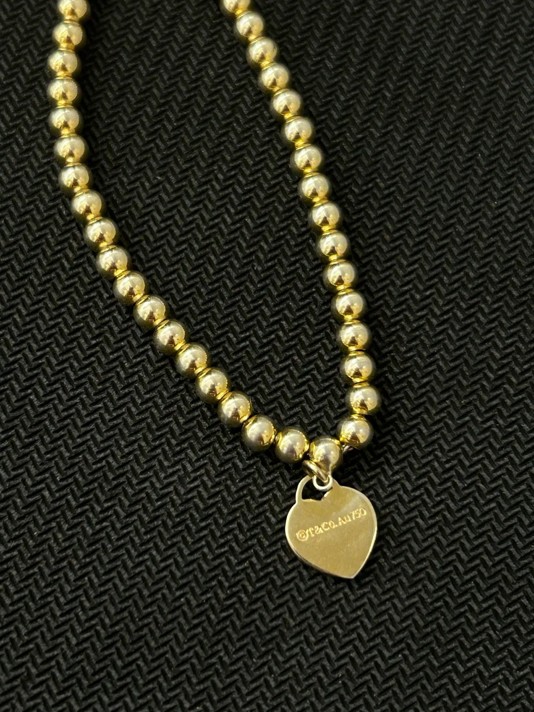 Tiffany & Co. Gold Bead Heart Tag Bracelet image indicator(4)