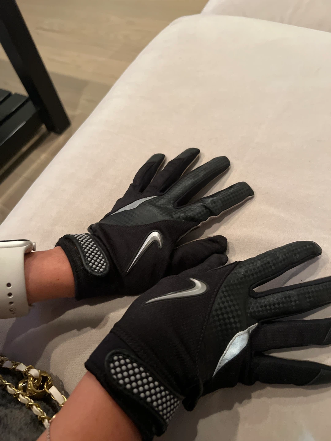 Paír of Nike womens Hyperdiamond softball batting gloves.