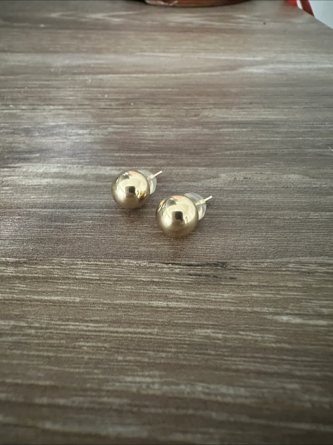 14k Solid Gold Ball Stud Earrings with silicone backs image indicator(3)