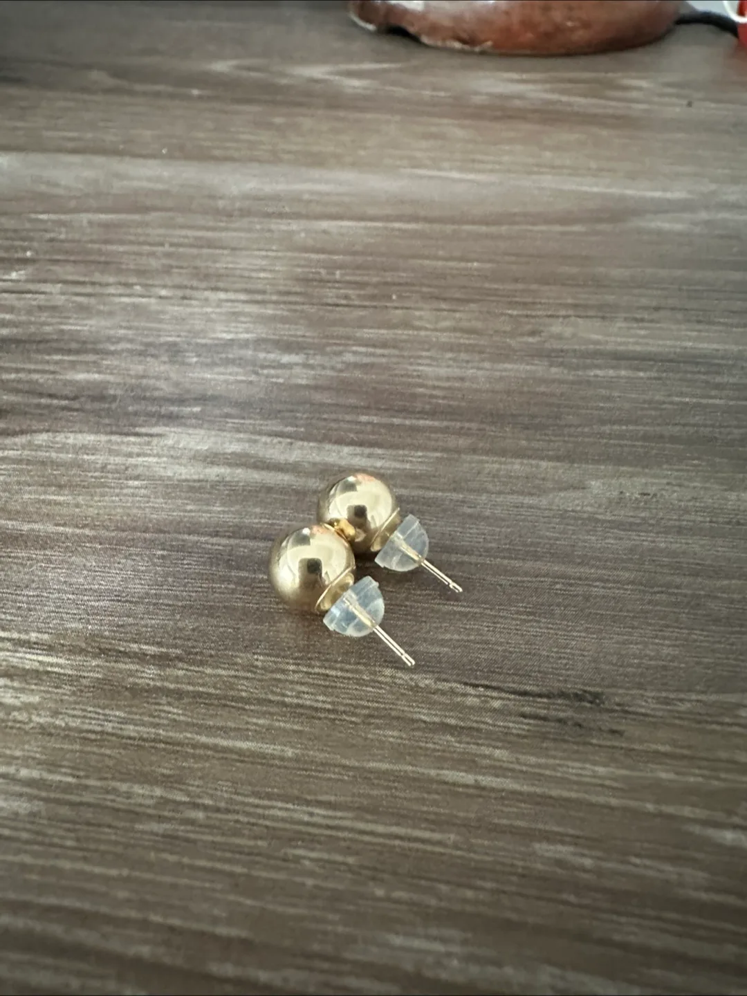 14k Solid Gold Ball Stud Earrings with silicone backs image indicator(4)