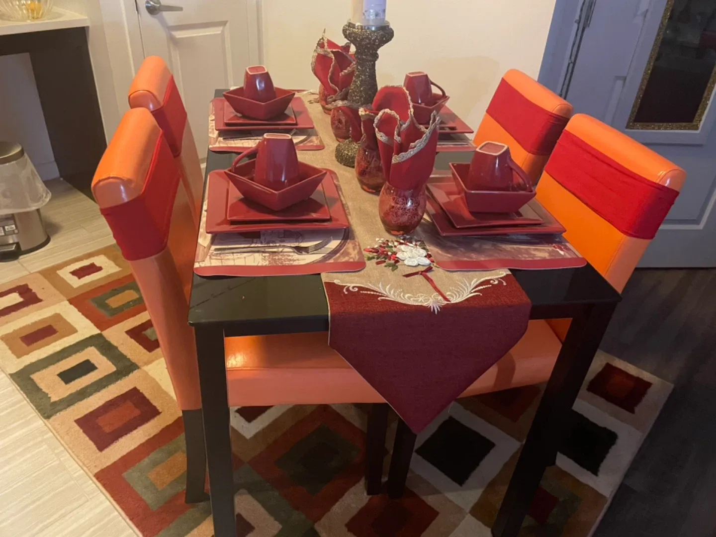 dining room table and 4 chairs , living room couch image indicator(2)