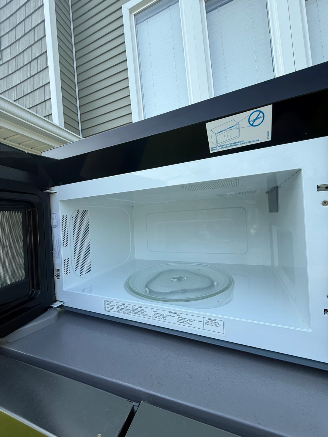 Frigidaire Side-by-Side Refrigerator & Whirlpool Microwave