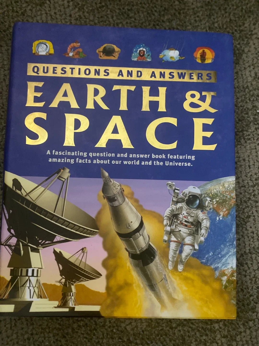 Earth & Space Questions and Answers Book thumbnail