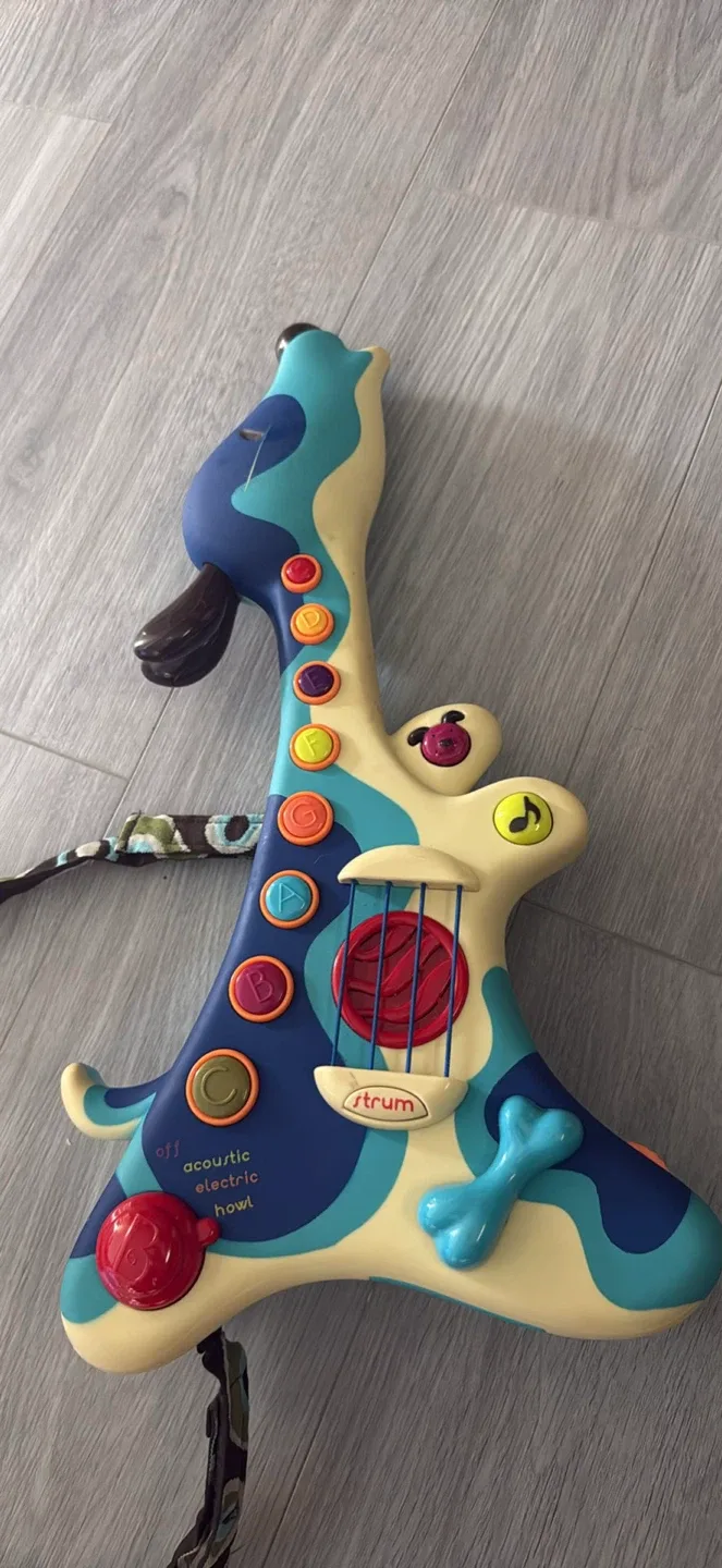 B. Toys Woofer Guitar thumbnail