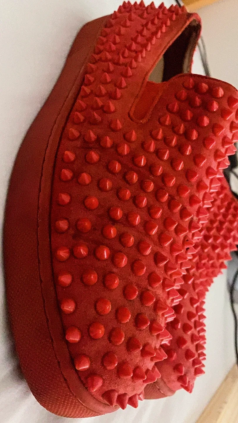 Christian Louboutin Red Spiked Slip-On Shoes image indicator(2)