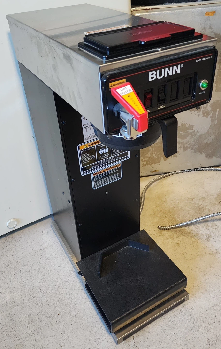 BUNN commercial coffee maker with 4 black push-down tab servers