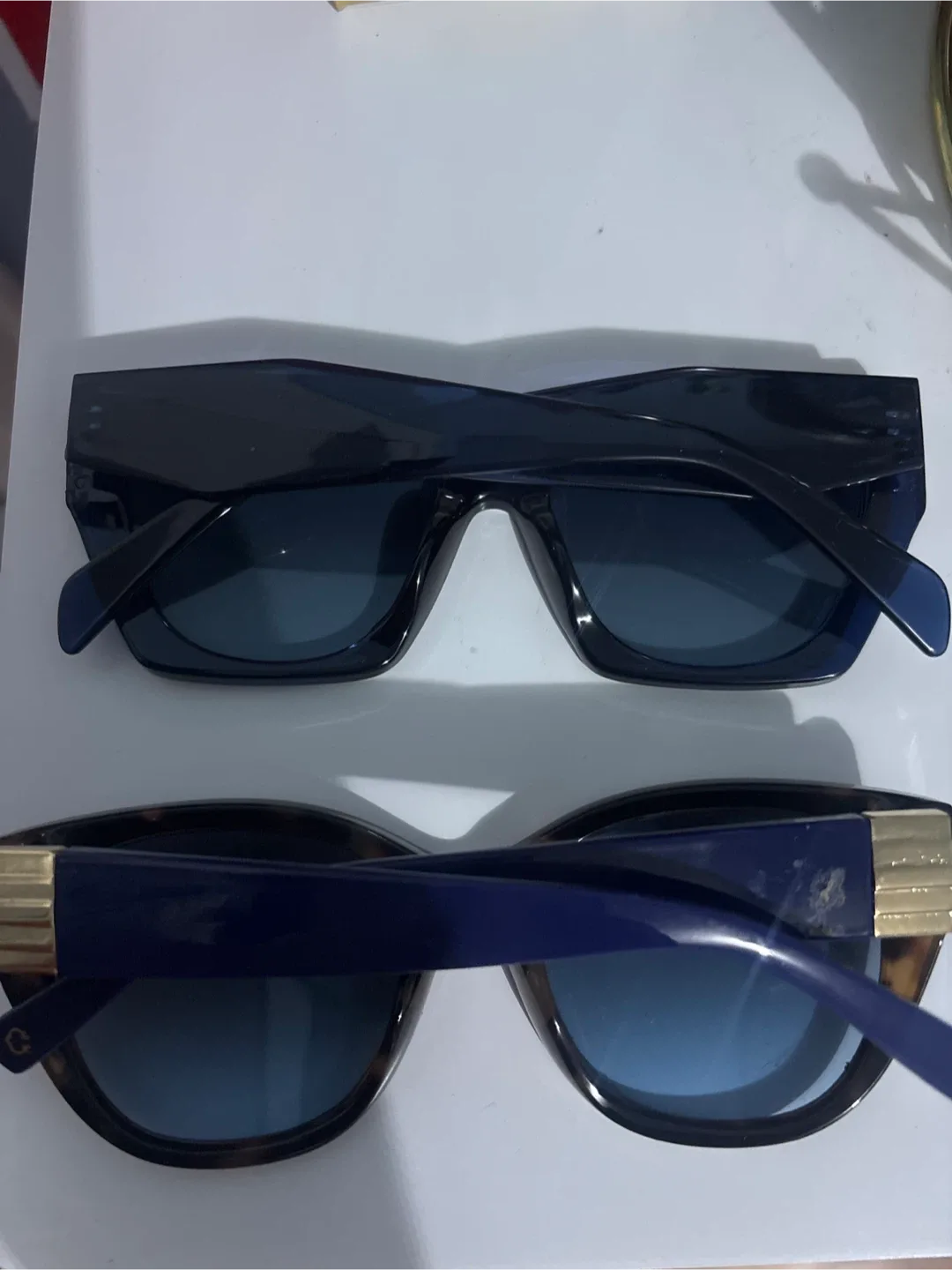 Two pairs of sunglasses top never used seco d used 5 times image indicator(2)