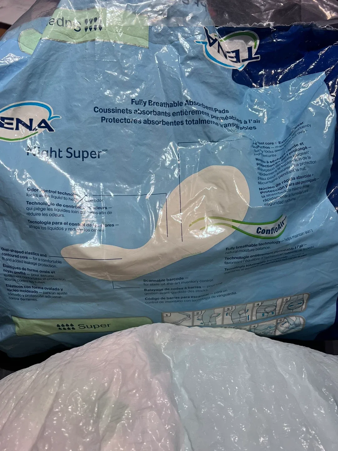 TENA Night Super Absorbent Pads, 24 Count image indicator(3)