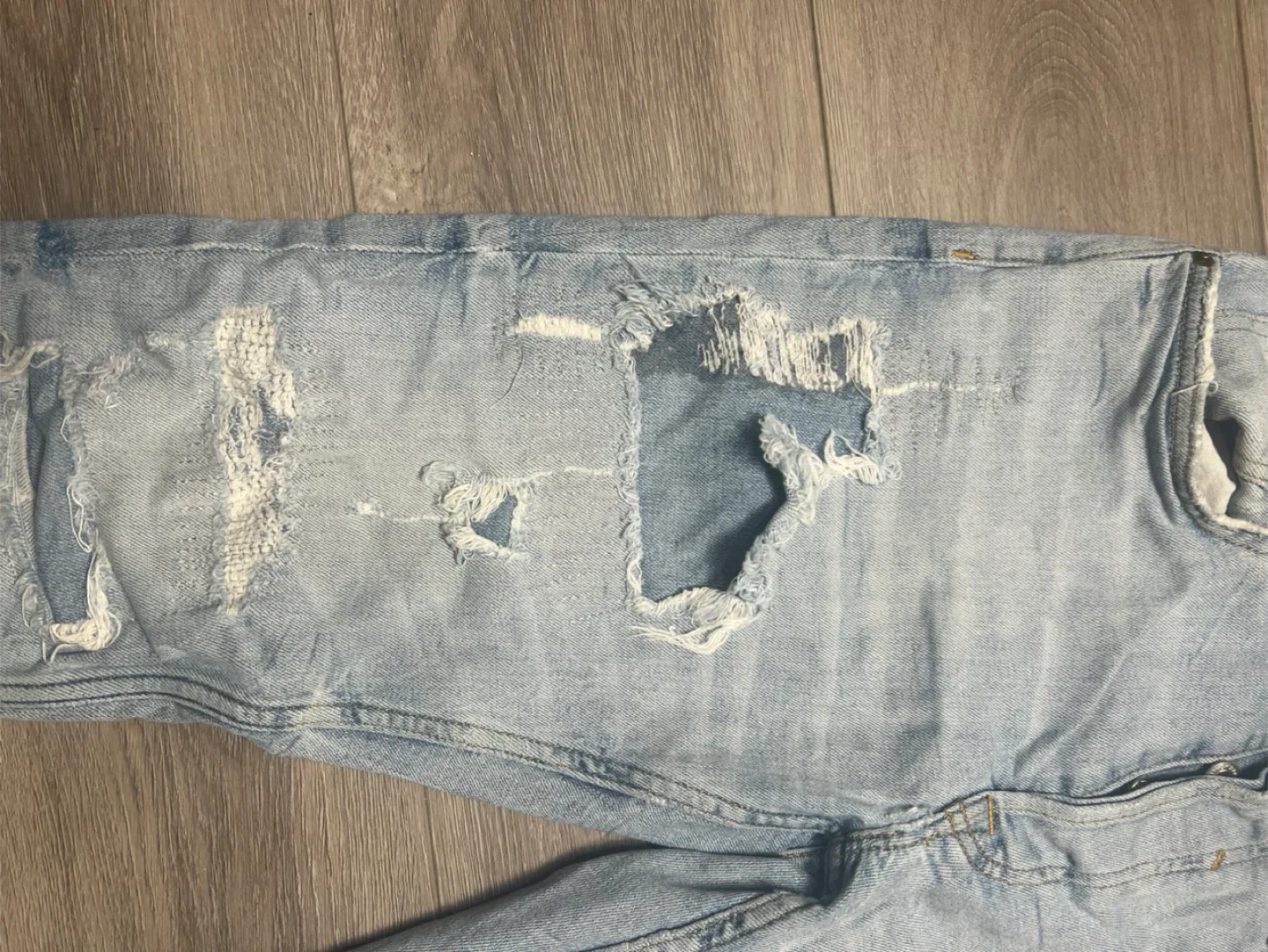 Distressed Light Wash Denim Jeans image indicator(3)