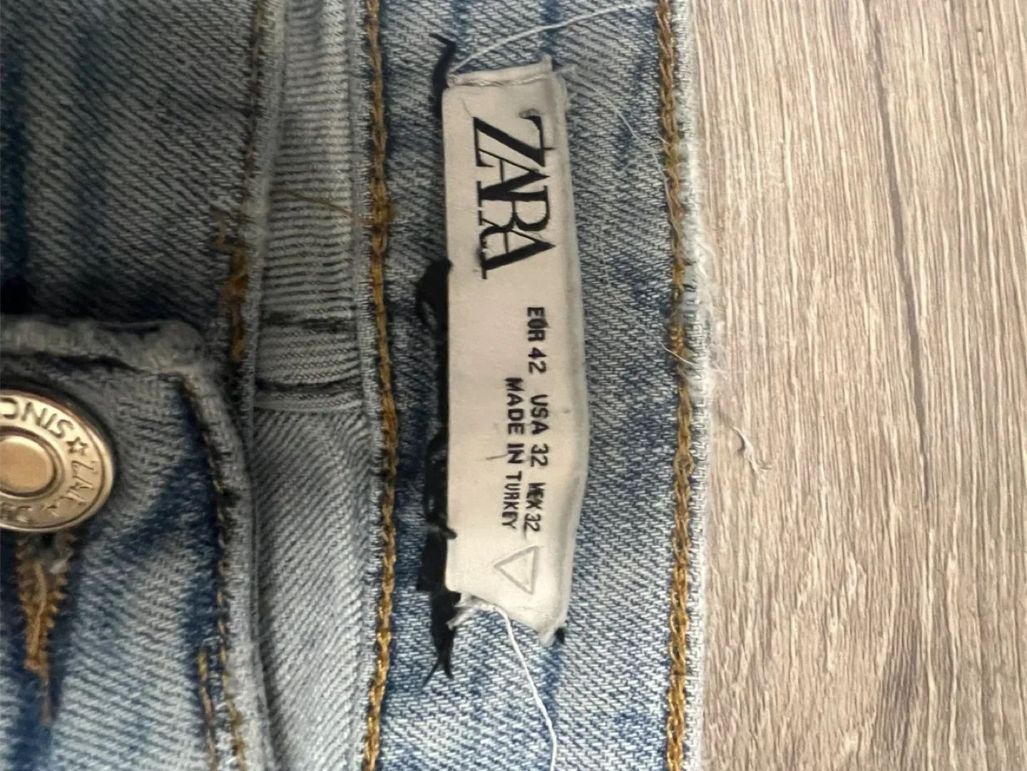 Distressed Light Wash Denim Jeans image indicator(7)