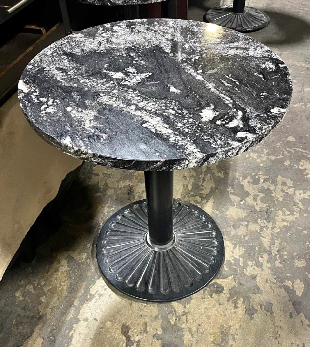 Round Marble Tables.