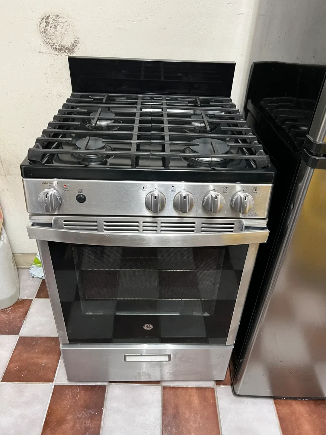 GE Gas Range and Haier Refrigerator