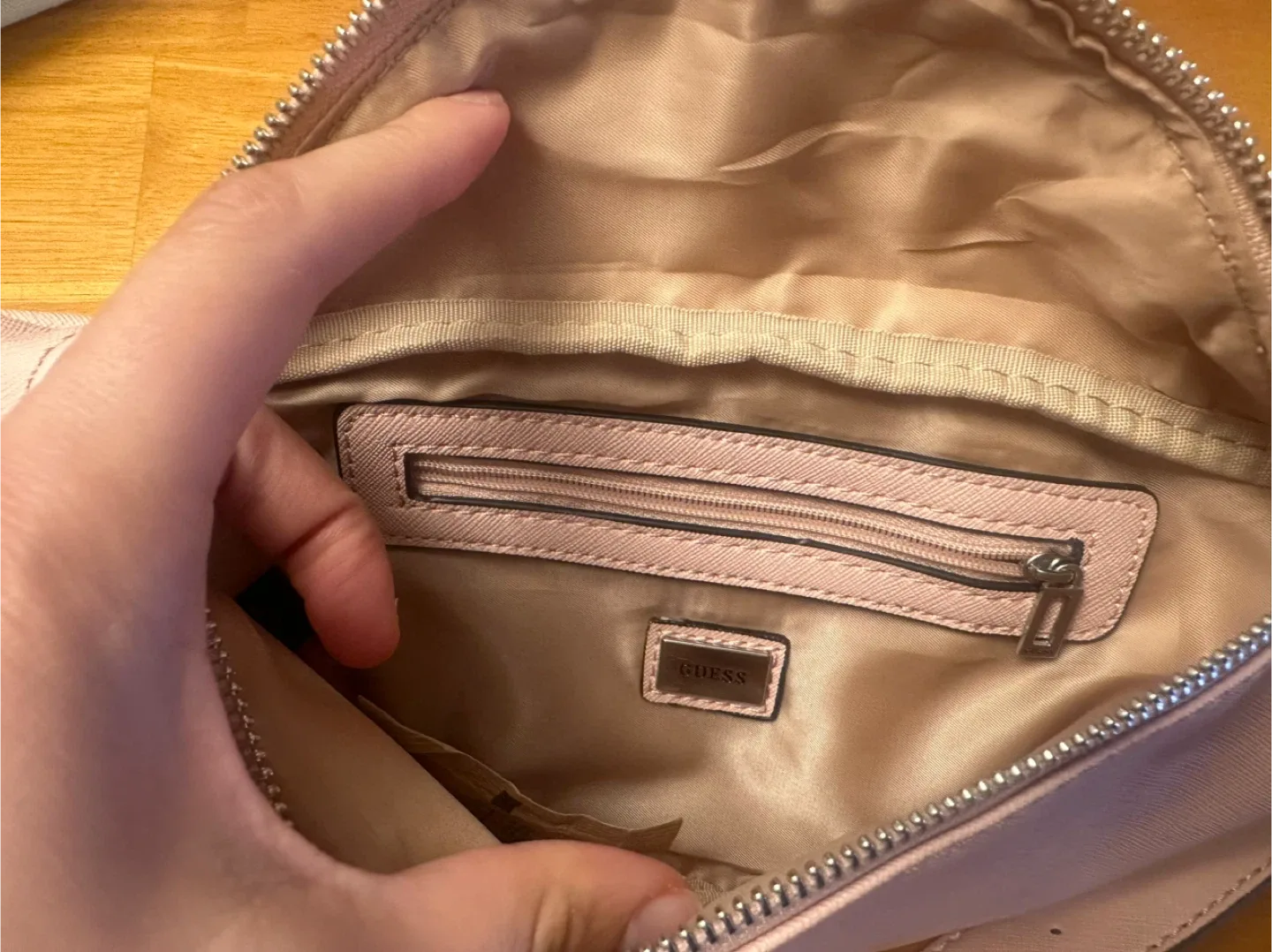 Guess pink multi-pocket fanny pack image indicator(2)