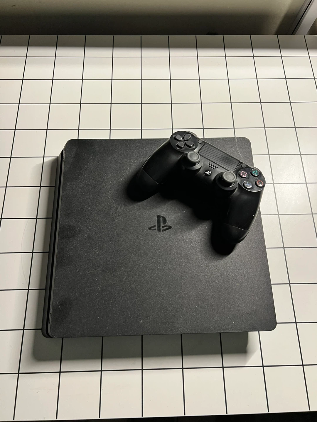 PlayStation 4 Slim Console with Controller