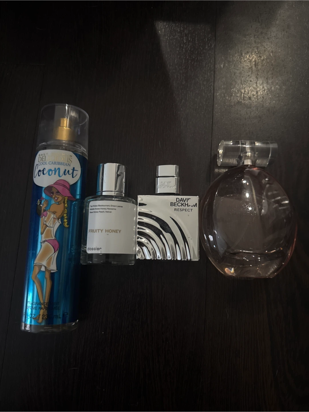 assortment of perfumes- Dossier Fruity Honey Perfume