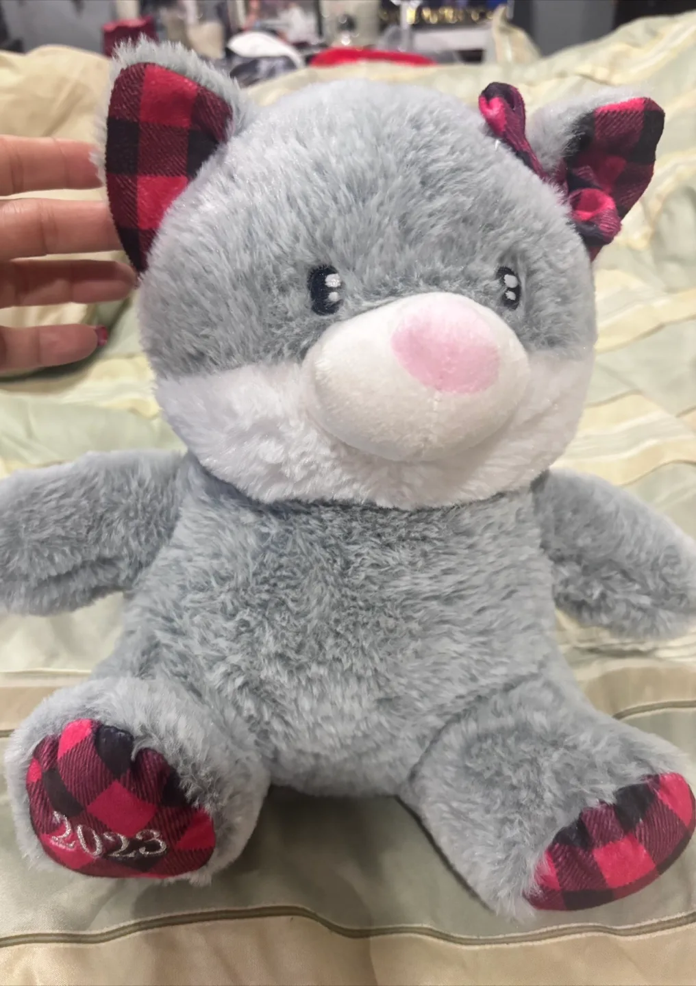 Gray Plush Animal with Red Plaid Accents - 2023 image indicator(2)