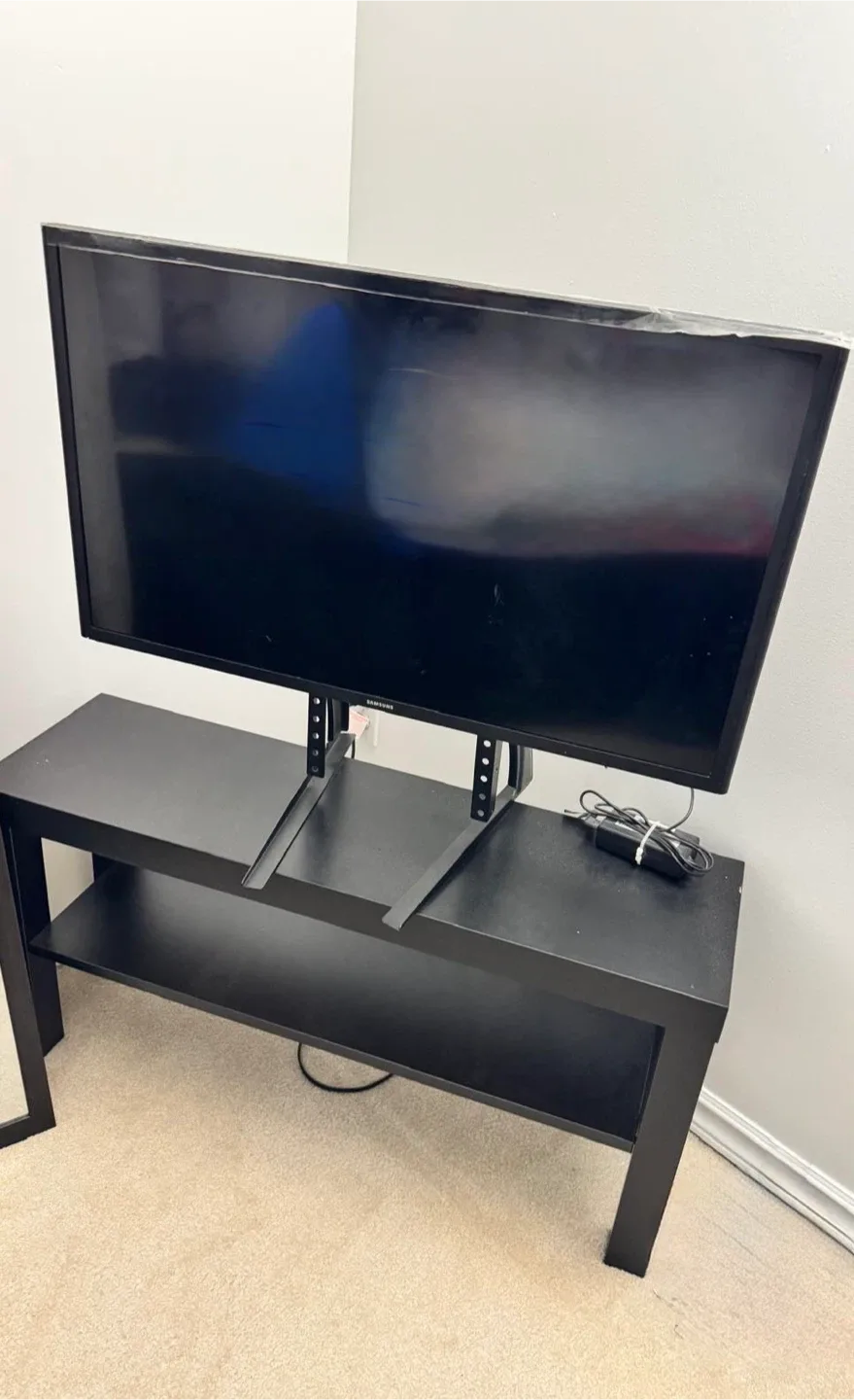 Samsung TV & Black TV Stand thumbnail