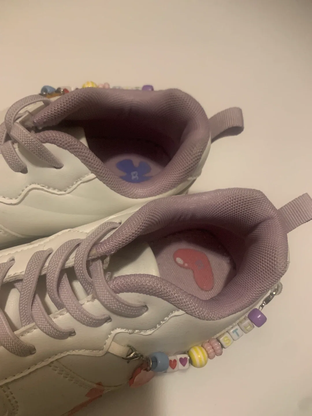 Stitch Sneakers with Beaded Charms image indicator(3)