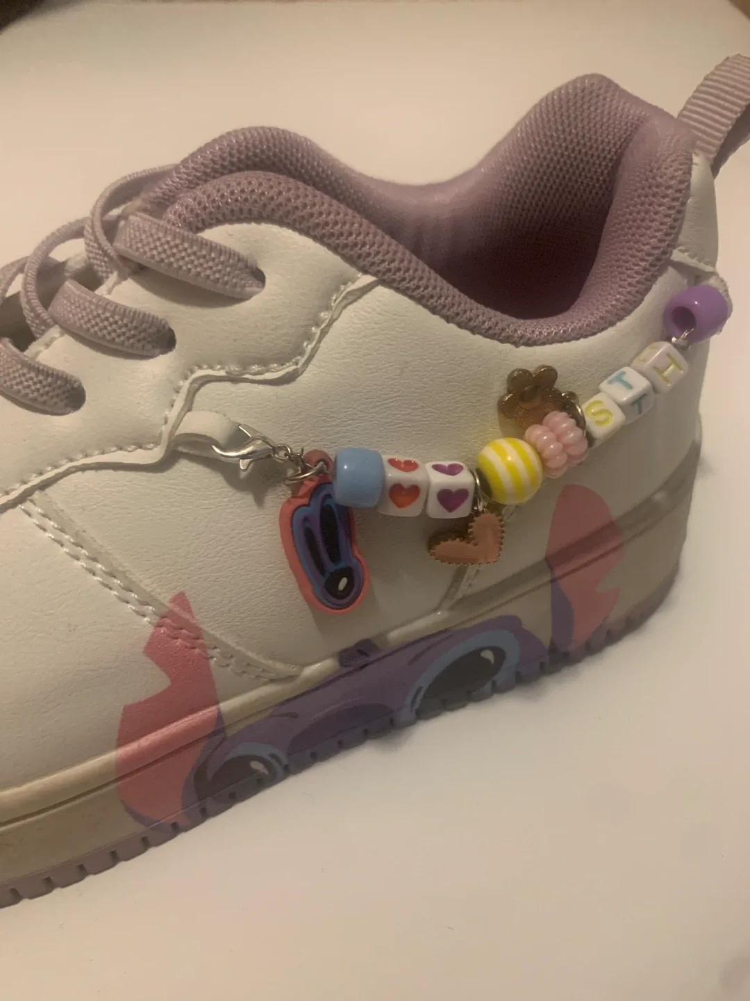 Stitch Sneakers with Beaded Charms image indicator(2)