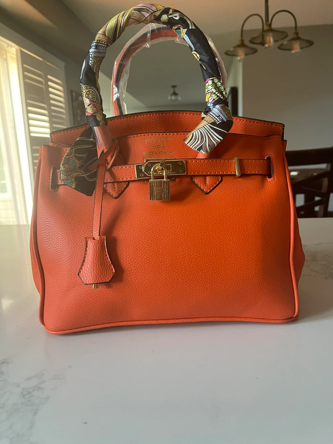 Orange Handbag with Scarf Accent