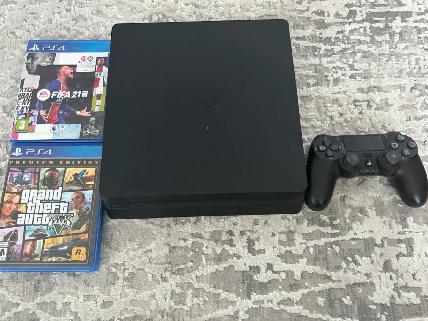 1TB PlayStation 4 Slim with Games image indicator(4)