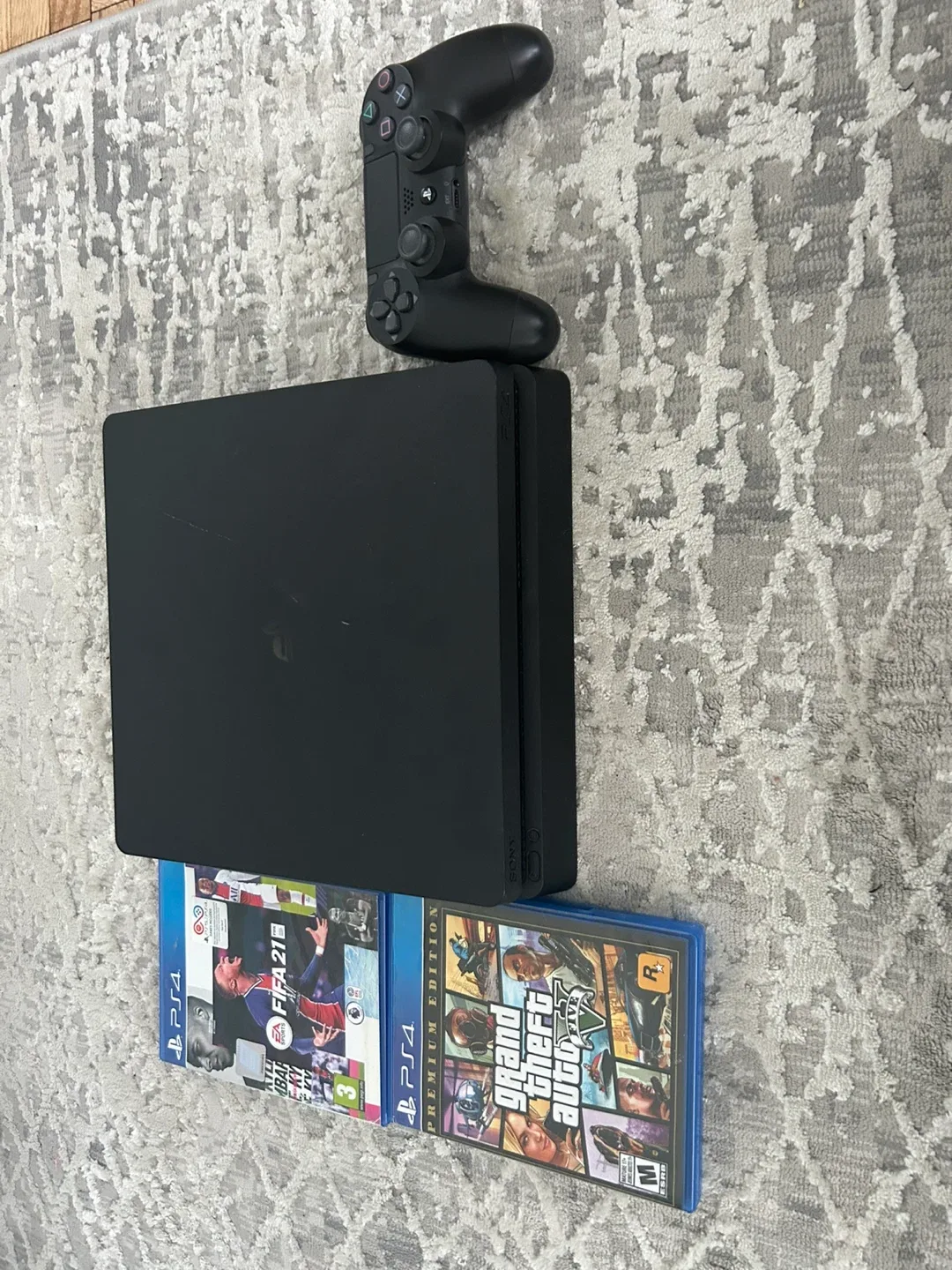 1TB PlayStation 4 Slim with Games image indicator(5)