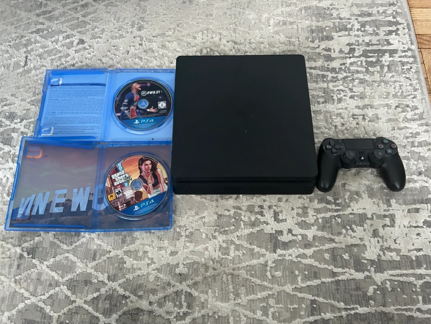 1TB PlayStation 4 Slim with Games image indicator(6)