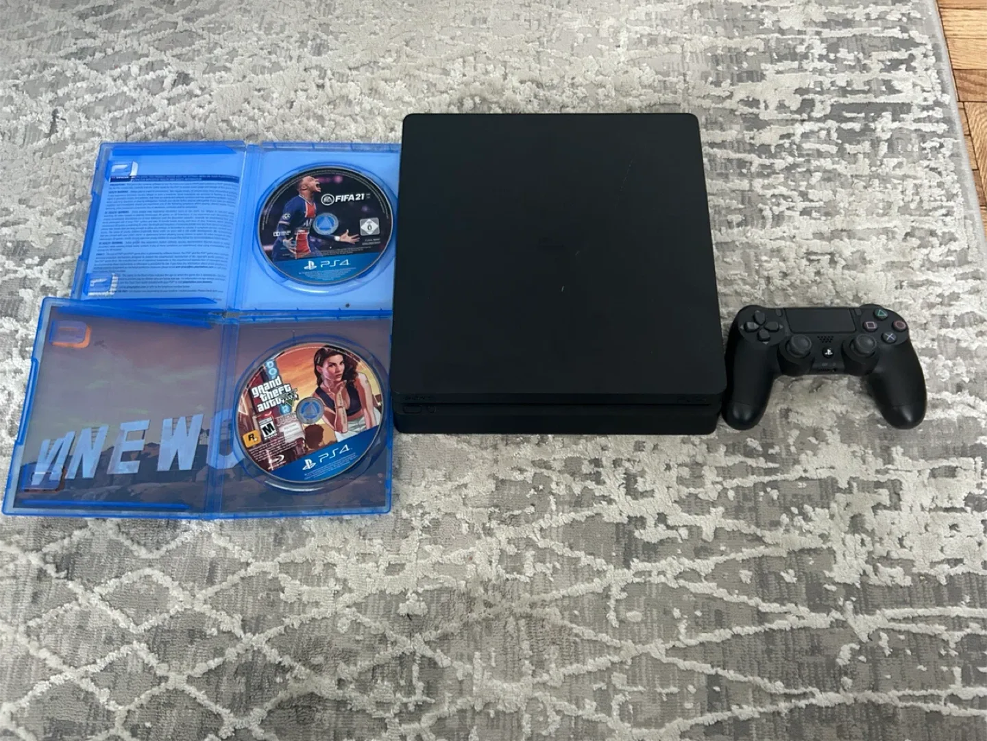1TB PlayStation 4 Slim with Games image indicator(3)