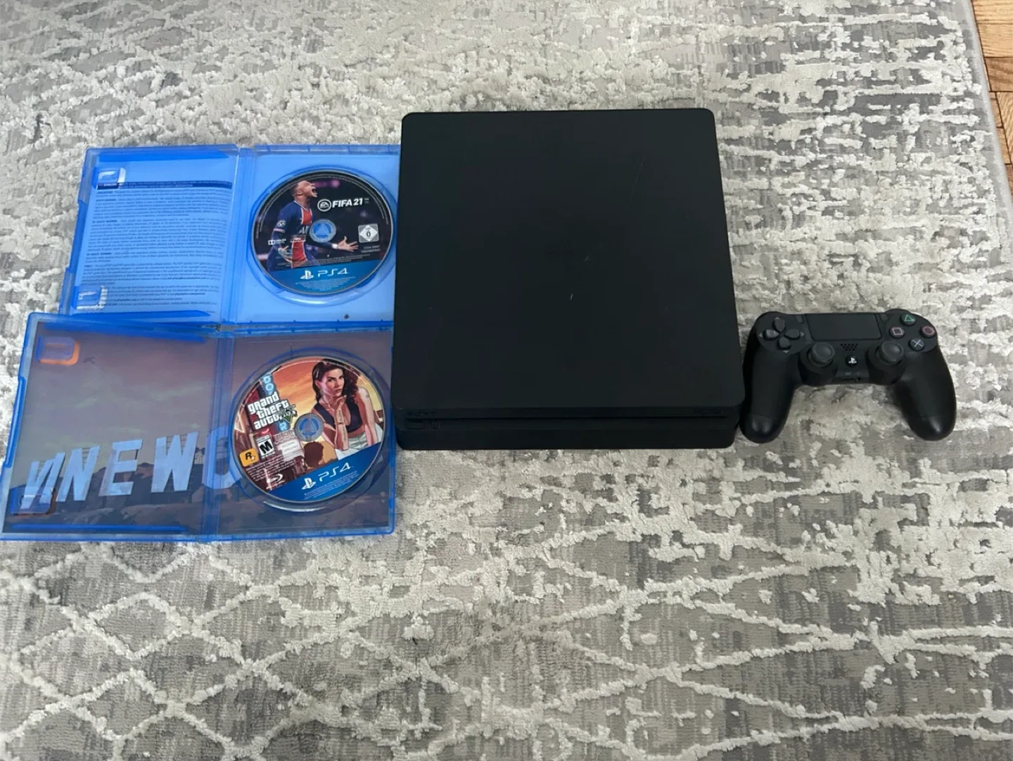 1TB PlayStation 4 Slim with Games image indicator(7)