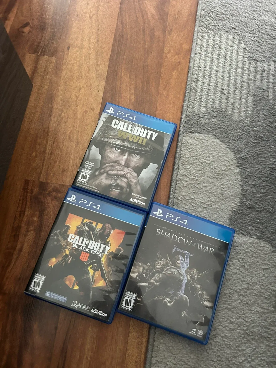 Sony PlayStation 4 Slim with Games & Controllers image indicator(4)