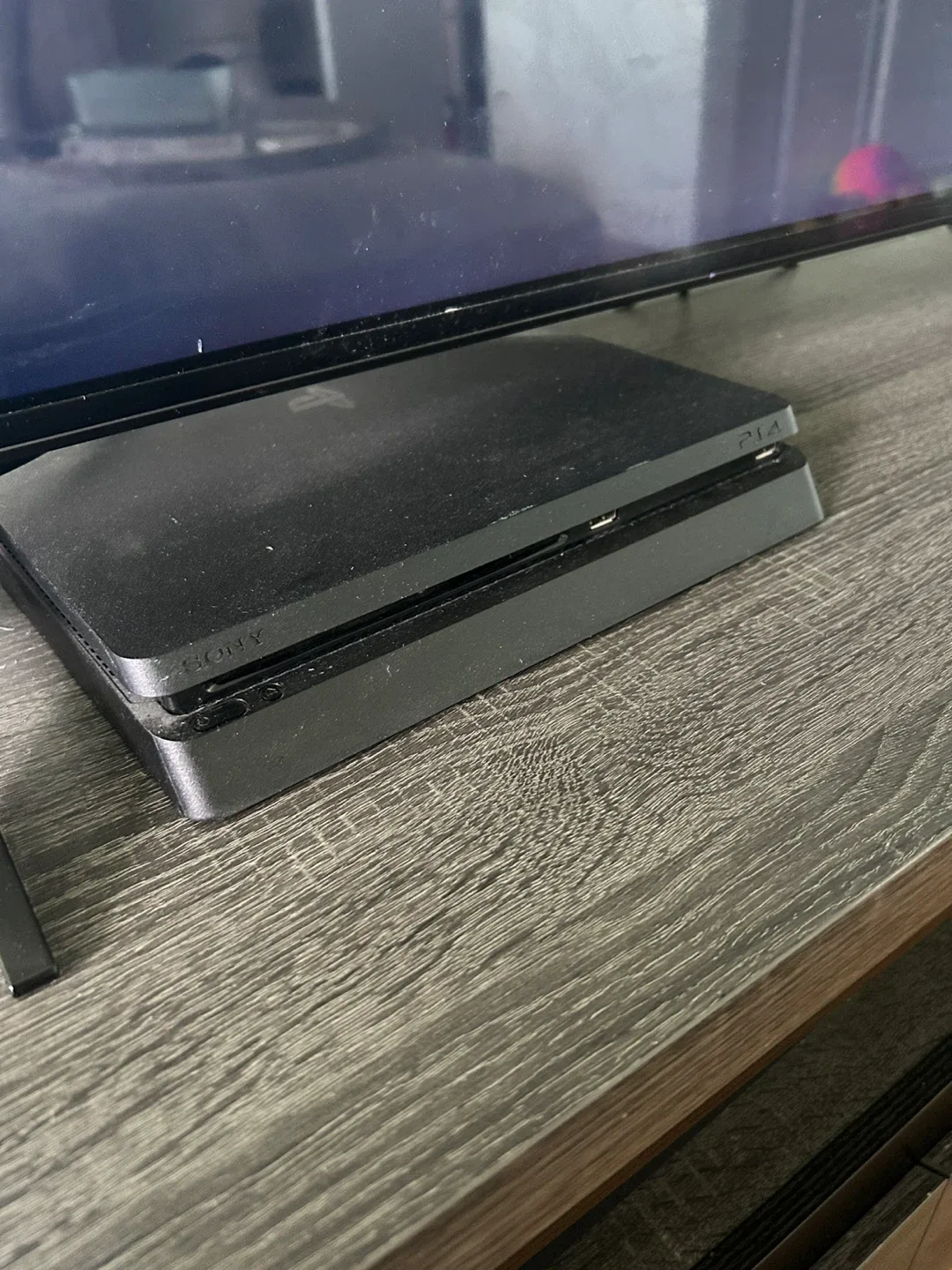 Sony PlayStation 4 Slim with Games & Controllers image indicator(2)