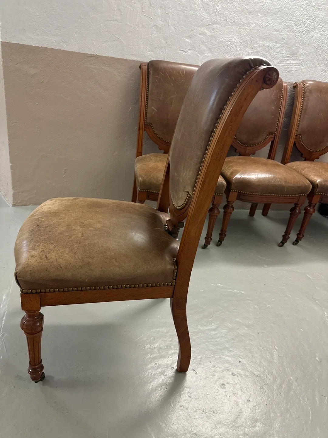 Five Antique Brown Leather Dining Chairs thumbnail