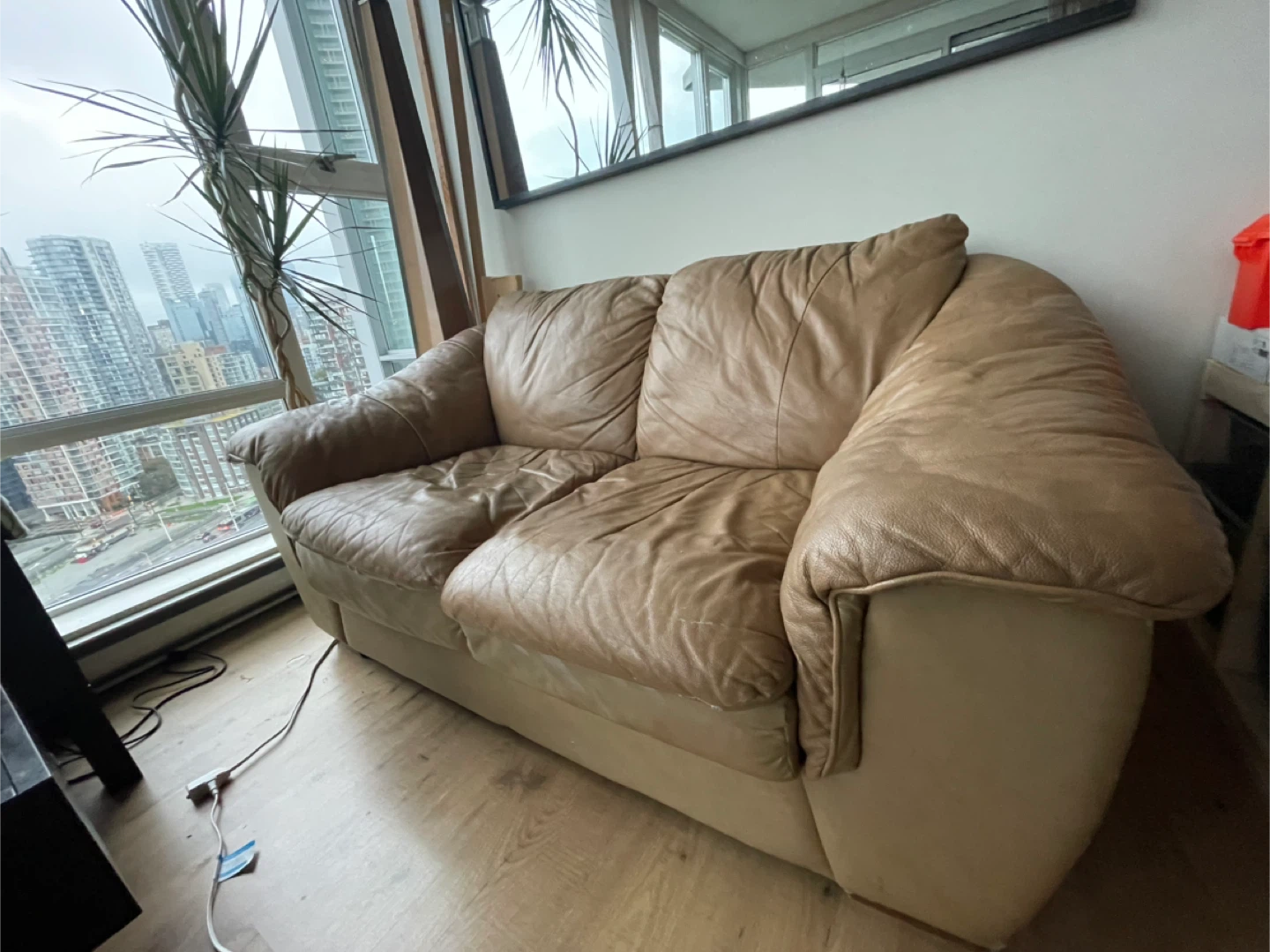 Used Beige Leather Two-Seater Sofa