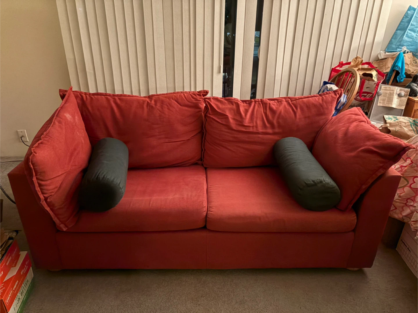 Red Two-Seater Sofabed with Bolster Pillows - photo 2
