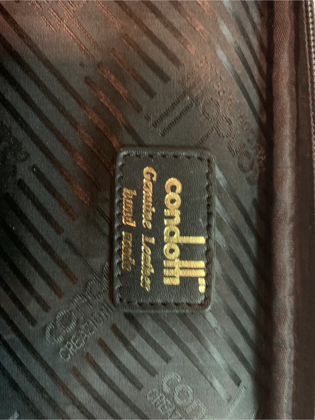 Black Leather Rolling Carry-On Suitcase image indicator(4)