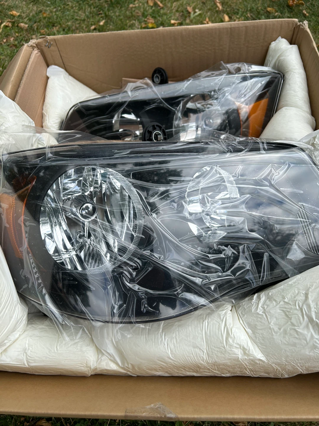 Dodge Caravan/Chrysler Town & Country headlights  - New in Box