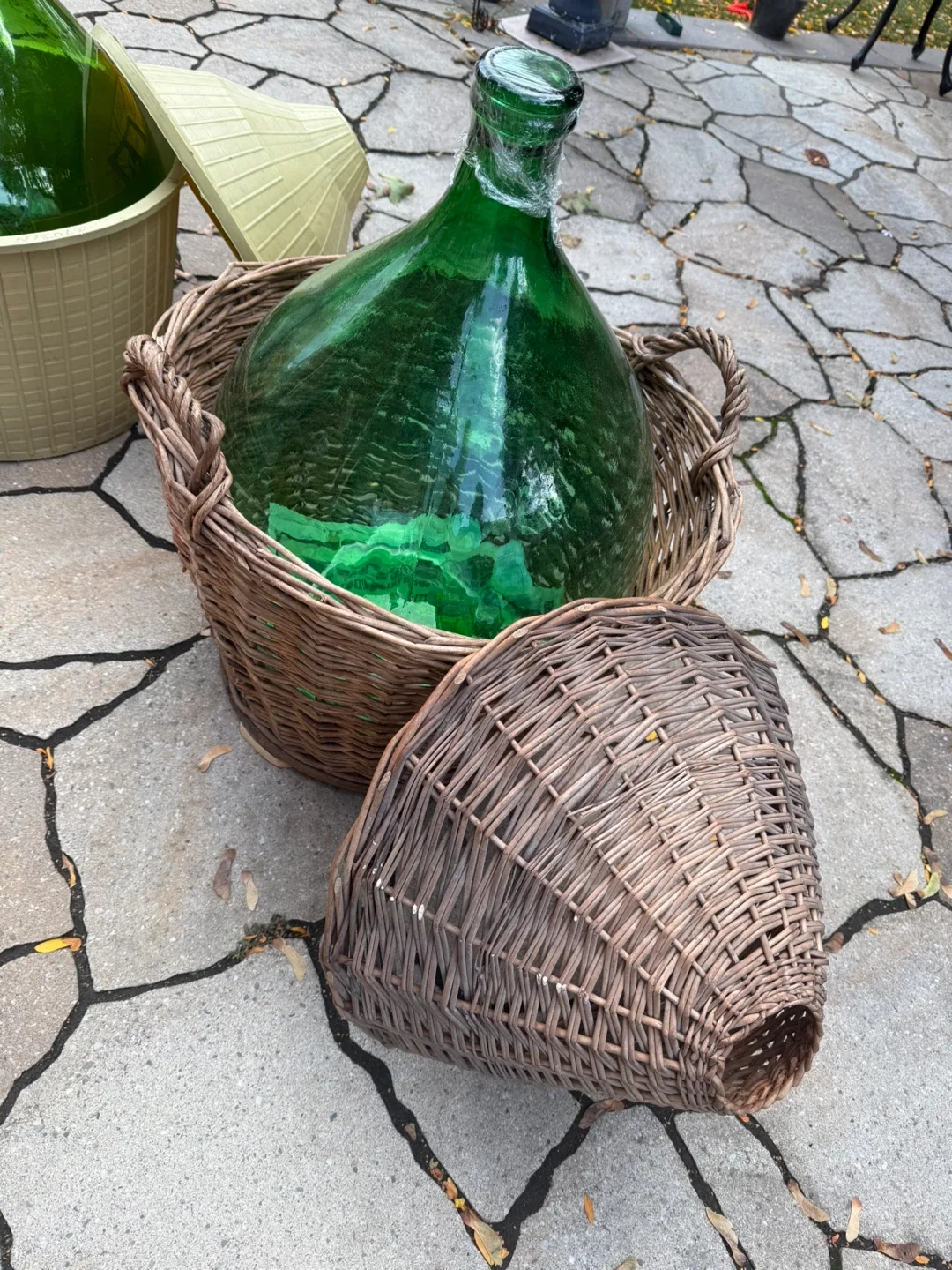 Large Green Glass Demijohn in Wicker Basket